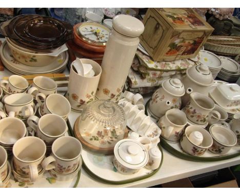 An extensive St Michael Pottery tea and coffee service, decorated in the Autumn leaves pattern, together with a clock, scales