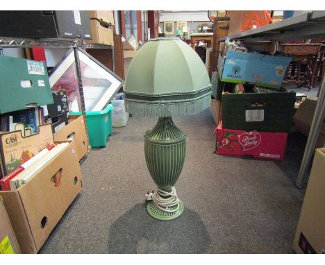 A green ceramic table lamp with shade, 67cm tall