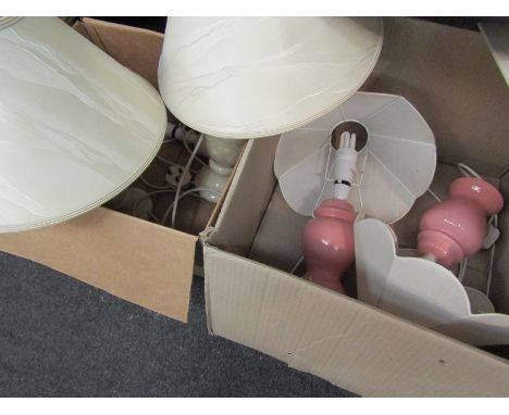 Three alabaster bedside table lamps, two pink ceramic bedside table lamps and a lamp shade