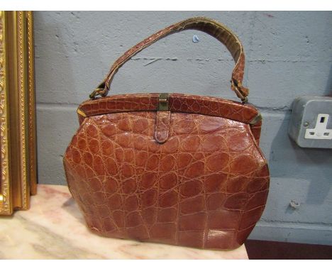 A vintage Bagcraft crocodile skin leather lady's clutch bag