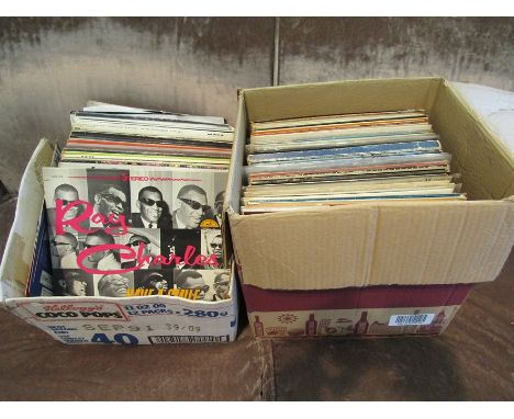 Twop boxes of mixed LP's and singles including Ray Charles, Jean Michel Jarre, Al Stewart, Michael Jackson, etc