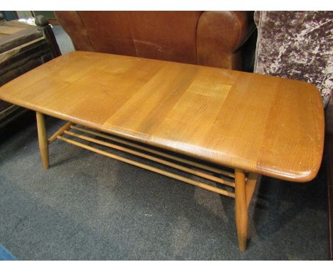 An Ercol coffee table, 36cm x 104cm x 46cm