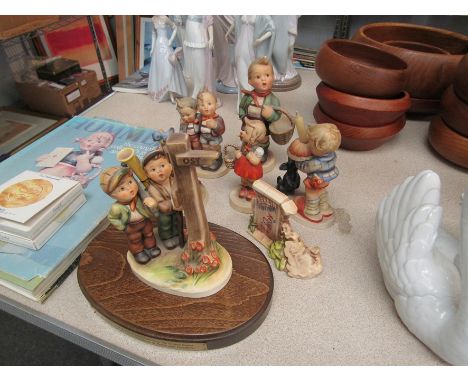 Various Goebel Hummel figurines and book