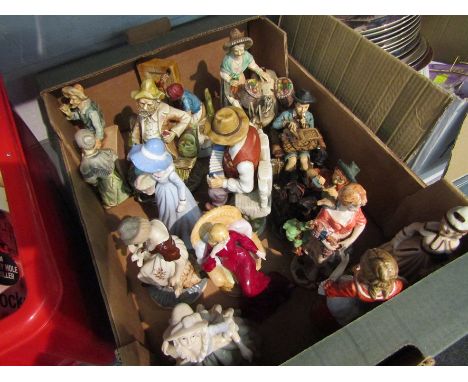 A box of various ceramic ladies and Capodimonte style figures     