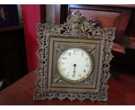 An R &amp; Co Paris easel back clock with ornate pierced border, 24cm x 20cm