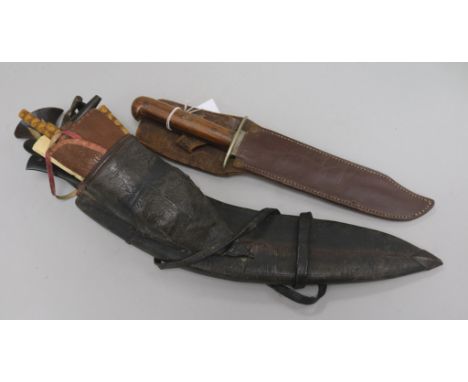 A Kukri with accessories to scabbard and a Burmese dagger