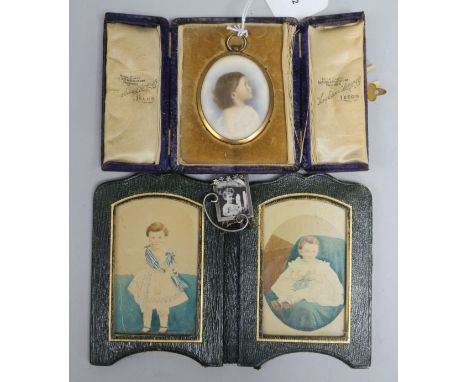 An oval miniature watercolour portrait of a young girl, a miniature silver photograph frame and a pair of overpainted photogr