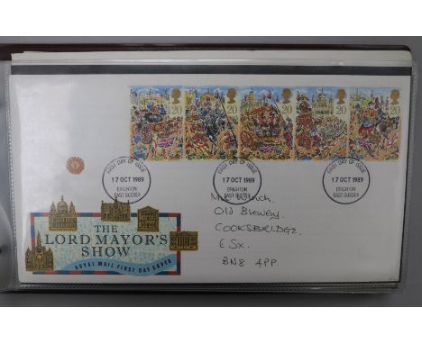 A collection of mint GB stamps and First Day Covers