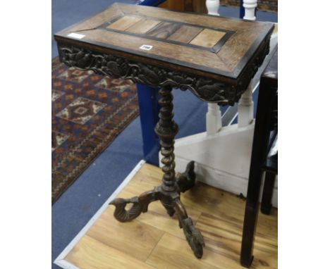 A Ceylonese specimen wood tripod table, W.56cm