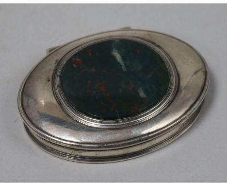 A late 18th/early 19th century silver oval snuff box, the lid inset with bloodstone panel, maker's monogram EA? conjoined, 8.