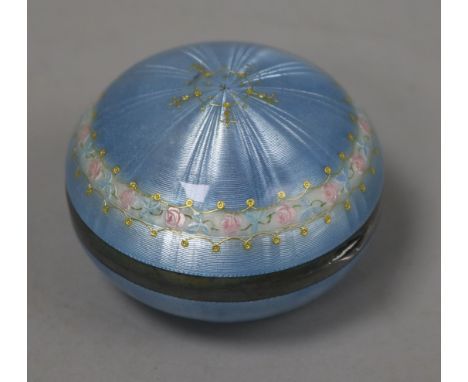 An early 20th century continental silver and blue guilloche enamel circular powder box, with hinged lid and decorated with ba