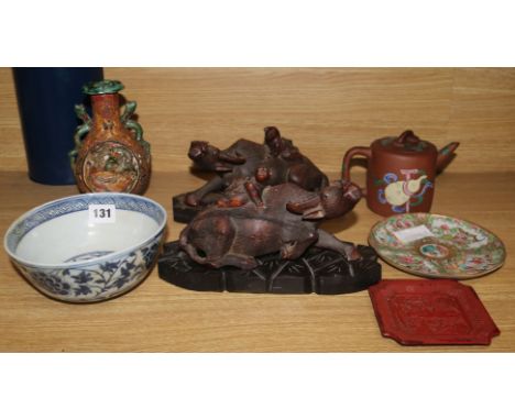 A carved buffalo vase, teapot etc.