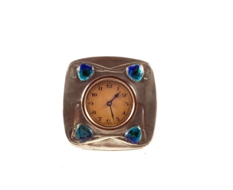 An Archibald Knox design Tudric pewter desk clock with Art Nouveau foliate design and enamel hearts, No. 0482