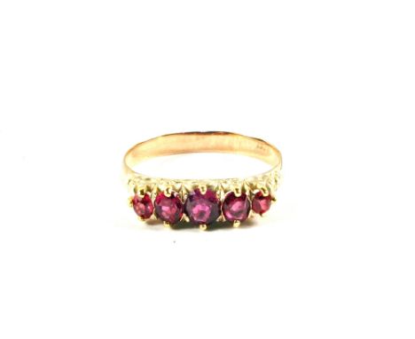 A Gold five stone Ruby set ring, size L