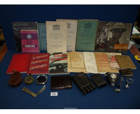 A quantity of pamphlets and military book dated 1940-1942, together with a Compass cigar case and cigarette case, etc.