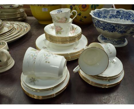 A quantity of Nanrich Pottery to include six tea cups and saucers, six tea plates, six dessert bowls and six dinner plates.