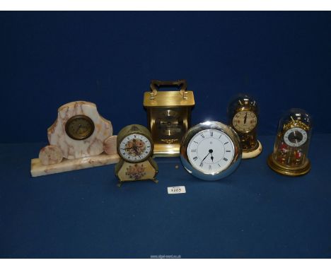 A quantity of clocks including tapestry and metal framed, pink marble, Anniversary clock, etc.