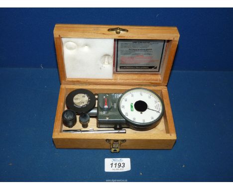 A vintage Lucas ATH4 Tachometer speed indicator in fitted wooden box with attachments.