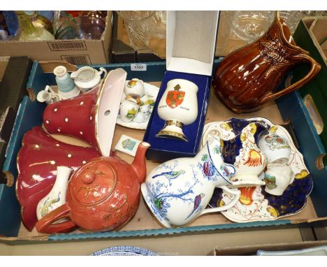 A quantity of china including Falconware wall pockets, Gaudy Welsh jug and plate, commemorative goblet, Goss, Arcadian and ot