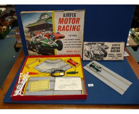 A boxed Airfix motor racing (1/32 scale) and accessory pack.