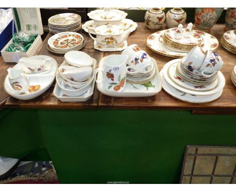 A quantity of Royal Worcester 'Evesham' china including cups and saucers, jugs, sauce boats, avocado dishes, etc.