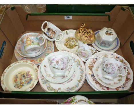 A quantity of Royal Doulton and Royal Albert nursery cup, saucers and plates, Wedgwood Mrs Tiggywinkle money box, Royal Doult