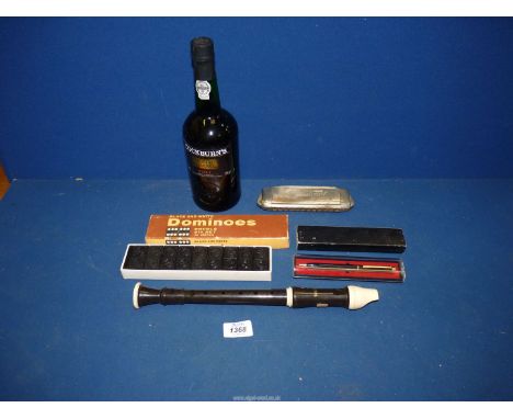 A sealed bottle of Cockburns Special Reserve Port, Hohner harmonica, cased ballpoint pen, box of dominoes and a recorder.