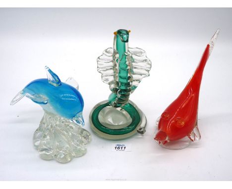 A Murano style orange glass fish with silver mica inclusions, cased in clear glass, 8'' tall x 6'' long, a Murano light blue 