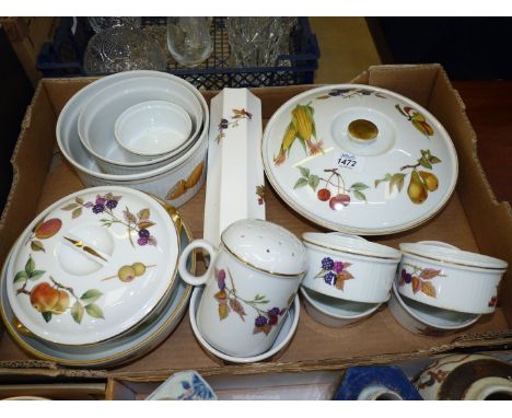 A quantity of Royal Worcester 'Evesham' china including flour shaker, souffle dishes, lidded serving dishes, etc.
