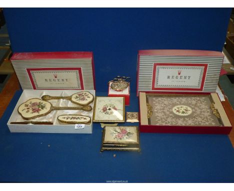 A Regent of London Petit Point dressing table set to include; tray, brushes, clock, lipstick holder, compact mirror and jewel