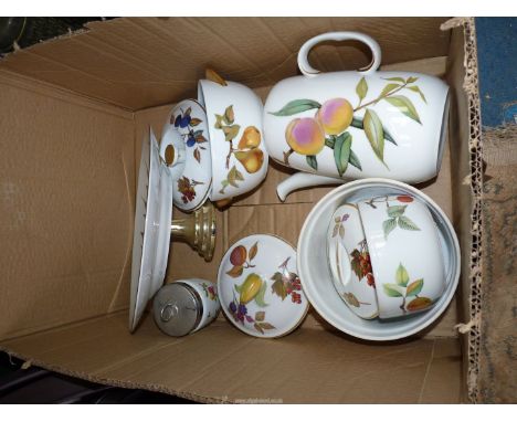 Royal Worcester Evesham china to include a teapot, three lidded dishes and lidded small pot, souffle dish and a fruit/cake pl