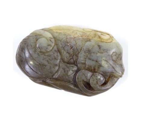 A Chinese relief carved jade beast, length 6cm 