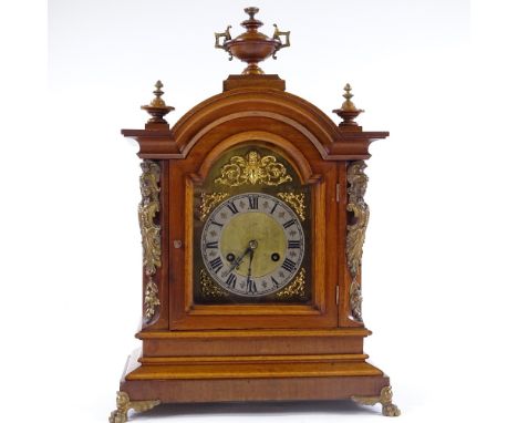 A 19th German walnut-cased dome-top mantel clock with brass dial, cast-brass moulding and mounts and 8-day striking movement,
