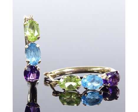 A pair of 9ct gold peridot blue topaz and amethyst hoop earrings, earring height 19.9mm, 1.5g 