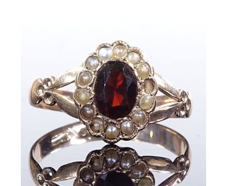 A 9ct gold garnet and split-pearl cluster ring, hallmarks Birmingham 1916, setting height 11.9mm, size P, 1.8g 