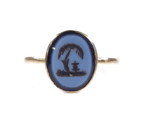 An unmarked gold intaglio carved sardonyx memorial seal ring, depicting urn under tree, setting height 11.3mm, size L, 1.3g 