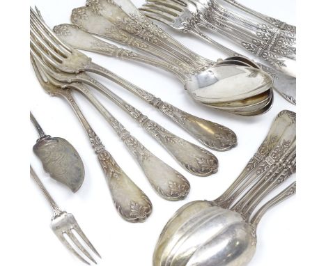 A set of French silver cutlery, comprising 4 dinner forks, 7 dessert forks, 4 dinner spoons, 6 dessert spoons, 1 cake fork an