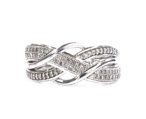 A sterling silver diamond crossover ring, total diamond content approx 0.2ct, setting height 8.5mm, size M, 3.2g 