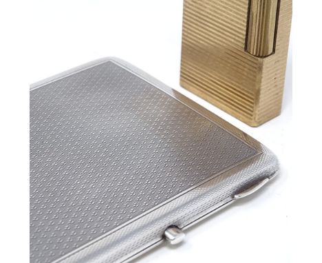 A George V engine turned cigarette case, by Mappin &amp; Webb, hallmarks Birmingham 1926, length 9cm, together with a gold pl