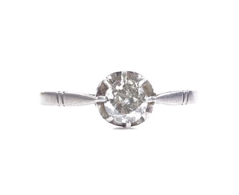An unmarked platinum 0.35ct solitaire diamond ring, setting height 6.2mm, size L, 1.6g 