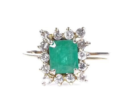 An 18ct gold emerald and diamond cluster ring, total diamond content approx 0.45ct, setting height 11.9mm, size Q, 3.3g 