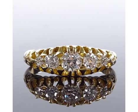 An 18ct gold 5-stone graduated diamond half-hoop ring, total diamond content approx 0.7ct, hallmarks Birmingham 1910, setting