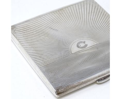 An Art Deco silver cigarette case, engine turned sunburst decoration and gilt interior, by William Hutton &amp; Sons Ltd, hal