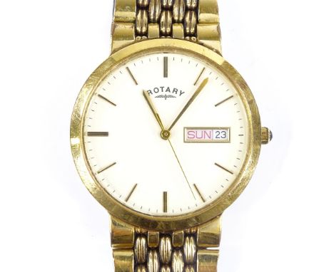 ROTARY - a gold plated quartz wristwatch, cream dial with gilded baton hour markers and day date aperture, case width 32mm, n