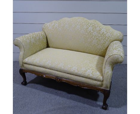 An upholstered scroll-end sofa on carved mahogany base, length approx 5' 