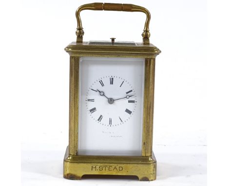 A French brass-cased carriage clock with repeat movement, height 12cm, and a Garrard brass-cased carriage clock (2) 