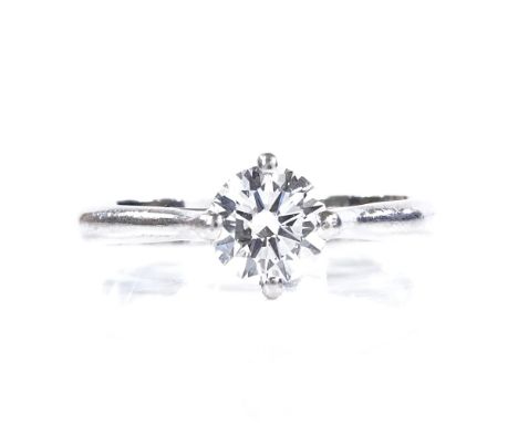 A platinum 0.71ct solitaire diamond ring, diamond measures: diameter - 5.86mm, depth - 3.46mm, size K, 3.5g 