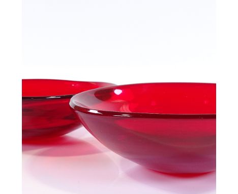 A pair of Whitefriars ruby red 3-sided bowls, designed by Geoffrey Baxter 1960-'63, 24.5cm across 
