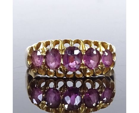 An 18ct gold 5-stone graduated amethyst half-hoop ring, setting height 7.1mm, size L, 2.3g 