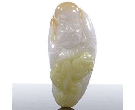 A Chinese relief carved jade reclining figure, length 8cm 